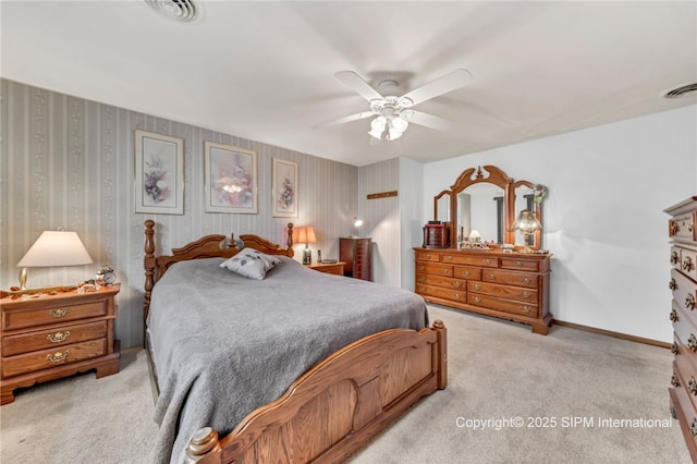 393 Bauman Rd, Amherst, NY 14221 - bedroom with light colored carpet, ceiling fan, wallpapered walls, and baseboards