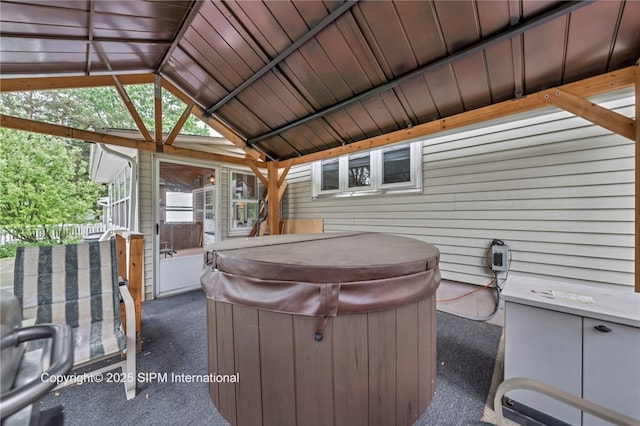 393 Bauman Rd, Amherst, NY 14221 - view of patio featuring a hot tub and a gazebo