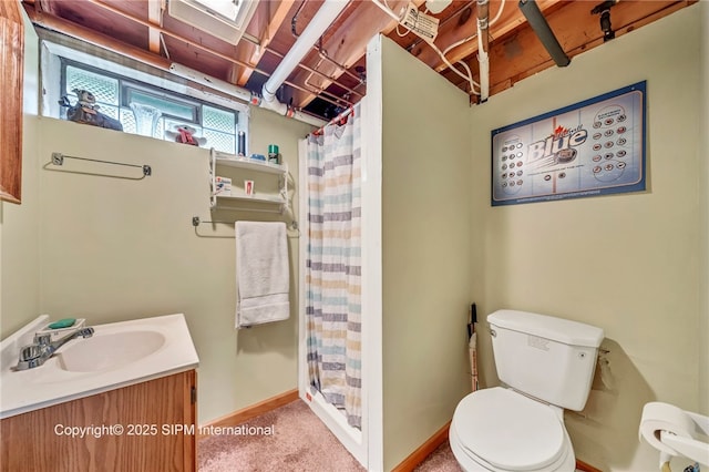393 Bauman Rd, Amherst, NY 14221 - bathroom featuring toilet, curtained shower, vanity, and baseboards