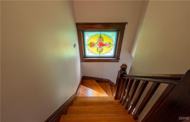 611 Turin St, Rome-Inside, NY 13440 - stairs with baseboards and wood finished floors