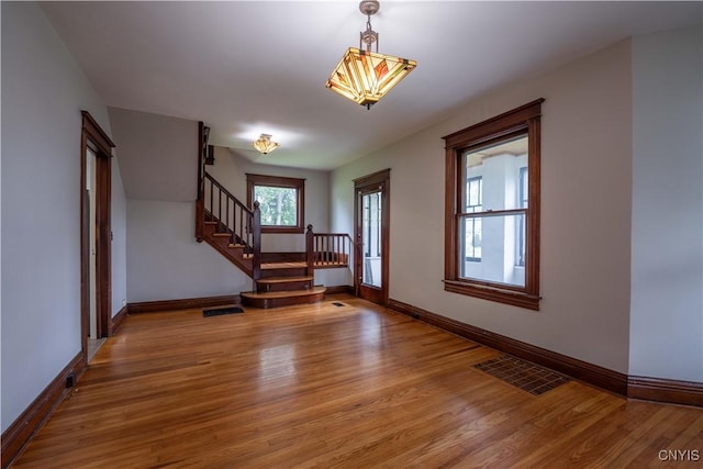 611 Turin St, Rome-Inside, NY 13440 - foyer entrance featuring light wood-style flooring, stairs, and baseboards