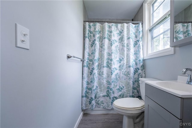 611 Turin St, Rome-Inside, NY 13440 - full bath featuring healthy amount of natural light, vanity, toilet, and wood finished floors