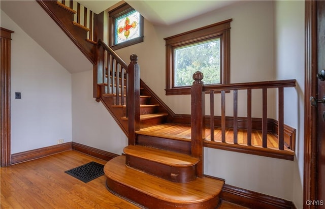 611 Turin St, Rome-Inside, NY 13440 - staircase featuring baseboards and wood finished floors