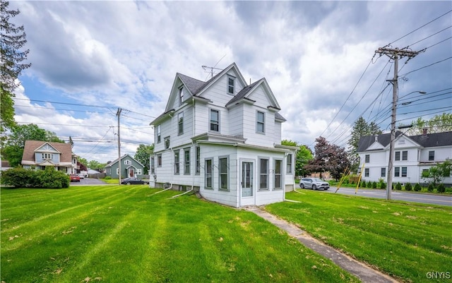611 Turin St, Rome-Inside, NY 13440 - view of side of property with a lawn