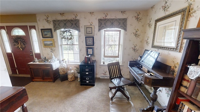 7404 Bonney Hill Rd, Hamilton, NY 13346 - carpeted home office featuring arched walkways, wallpapered walls, and baseboards