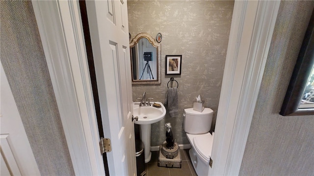 7404 Bonney Hill Rd, Hamilton, NY 13346 - half bathroom featuring wallpapered walls, toilet, and tile patterned flooring