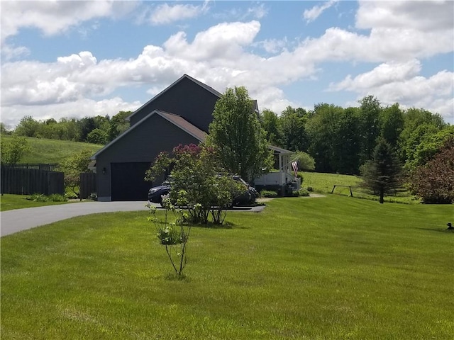 7404 Bonney Hill Rd, Hamilton, NY 13346 - view of side of home featuring driveway and an attached garage