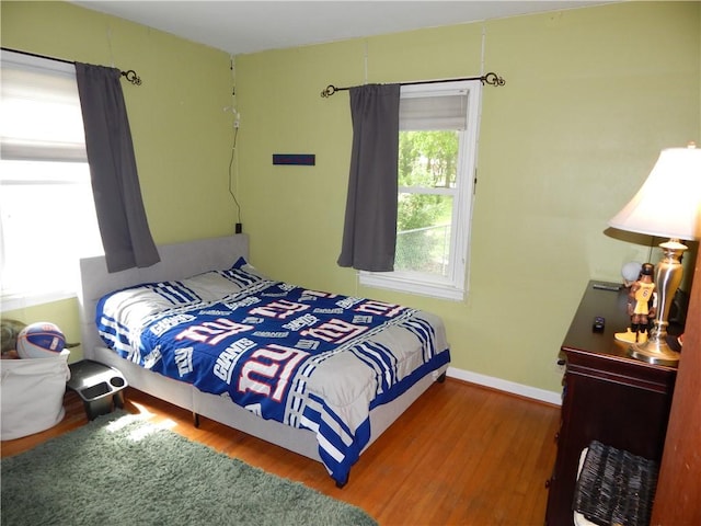 908 W 2nd St, Elmira, NY 14905 - bedroom with wood finished floors and baseboards