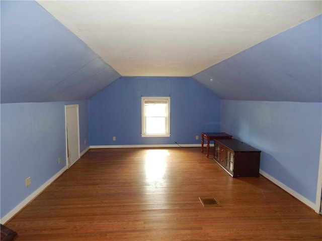 908 W 2nd St, Elmira, NY 14905 - bonus room with wood finished floors, lofted ceiling, and baseboards