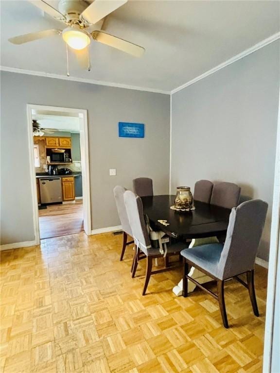 145 Decatur St, Corning-City, NY 14830 - dining area with a ceiling fan, ornamental molding, and baseboards
