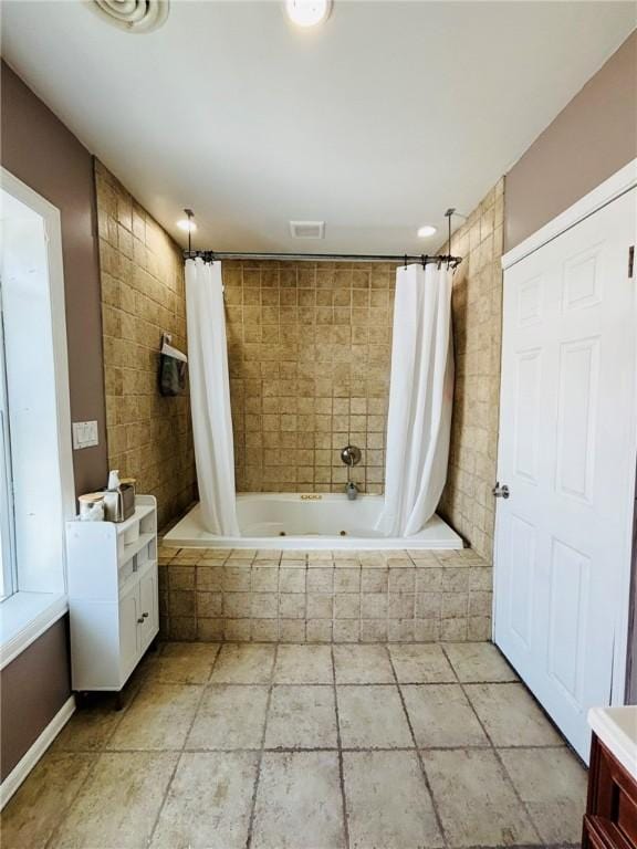 145 Decatur St, Corning-City, NY 14830 - bathroom featuring tiled shower / bath, vanity, and tile walls