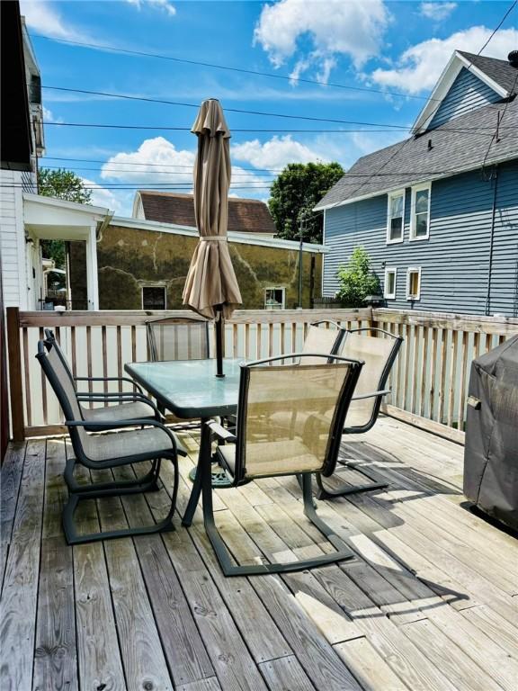 145 Decatur St, Corning-City, NY 14830 - deck featuring outdoor dining area