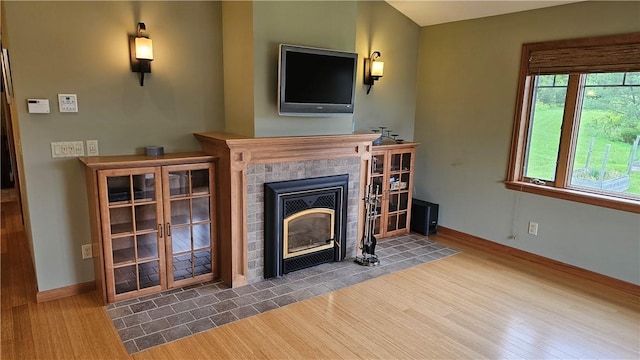 746 Gospel Hill Rd, Guilford, NY 13780 - living area with a fireplace and wood finished floors
