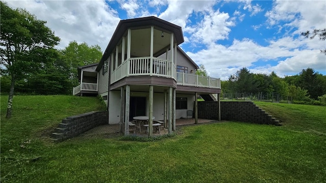 746 Gospel Hill Rd, Guilford, NY 13780 - rear view of house featuring a lawn, a deck, and a patio