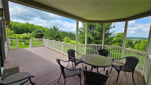 746 Gospel Hill Rd, Guilford, NY 13780 - wooden deck with outdoor dining area and a yard