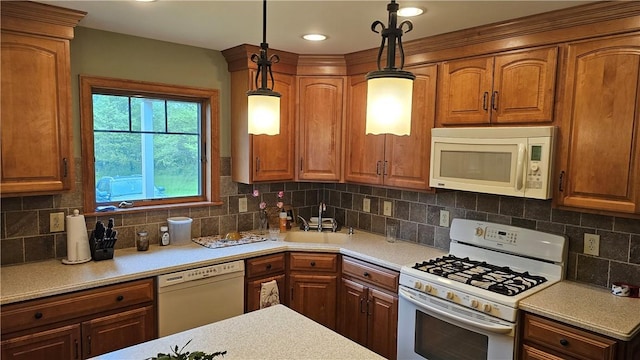 746 Gospel Hill Rd, Guilford, NY 13780 - kitchen with white appliances, light countertops, brown cabinetry, and recessed lighting