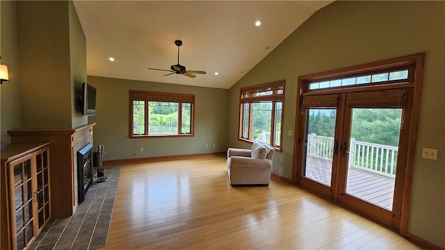 746 Gospel Hill Rd, Guilford, NY 13780 - living area with wood finished floors, a ceiling fan, a fireplace, high vaulted ceiling, and recessed lighting