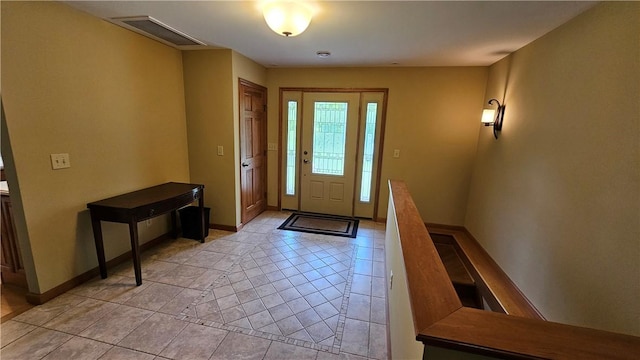 746 Gospel Hill Rd, Guilford, NY 13780 - foyer featuring light tile patterned floors and baseboards