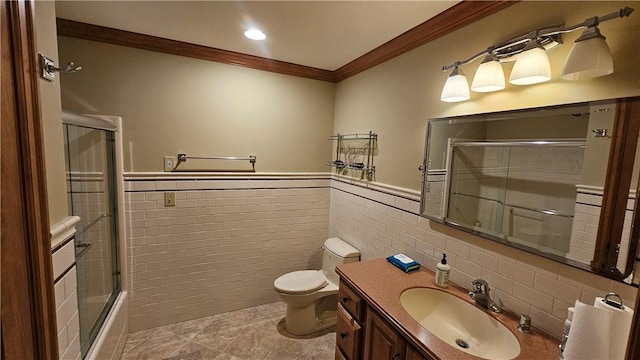 746 Gospel Hill Rd, Guilford, NY 13780 - bathroom with tile walls, crown molding, vanity, and wainscoting