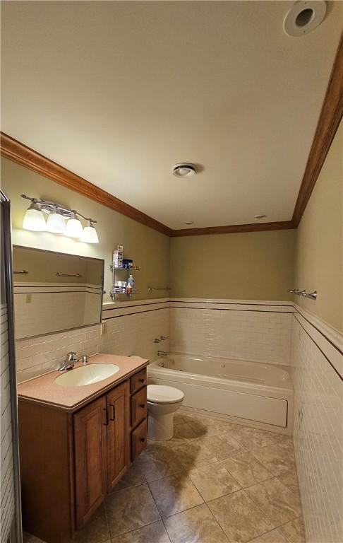 746 Gospel Hill Rd, Guilford, NY 13780 - full bath with a garden tub, vanity, crown molding, a wainscoted wall, and tile walls