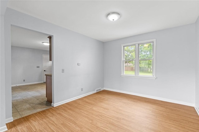 2200 W Henrietta Rd, Brighton, NY 14623 - unfurnished room featuring light wood finished floors and baseboards