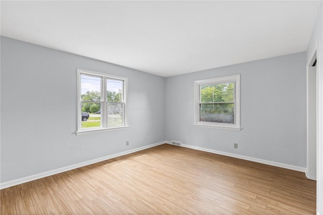 2200 W Henrietta Rd, Brighton, NY 14623 - spare room featuring light wood-type flooring and baseboards