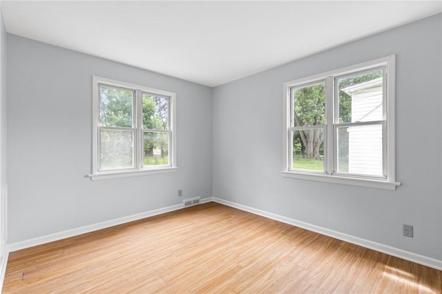 2200 W Henrietta Rd, Brighton, NY 14623 - empty room featuring light wood-type flooring and baseboards
