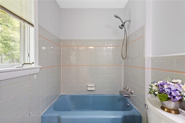 2200 W Henrietta Rd, Brighton, NY 14623 - full bath with tile walls, bathtub / shower combination, toilet, and plenty of natural light