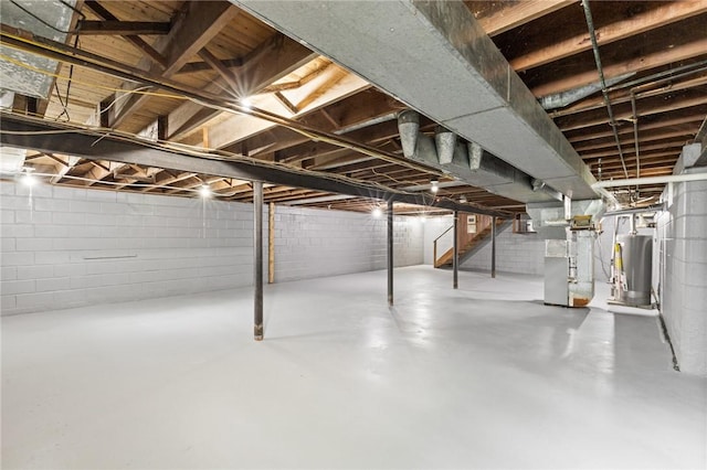 2200 W Henrietta Rd, Brighton, NY 14623 - unfinished below grade area with heating unit, stairway, and water heater