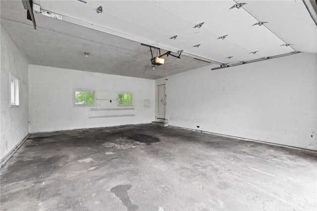 2200 W Henrietta Rd, Brighton, NY 14623 - garage featuring a garage door opener