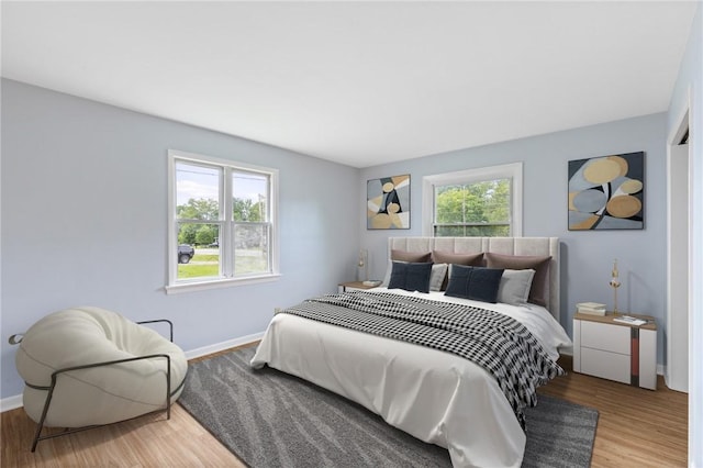 2200 W Henrietta Rd, Brighton, NY 14623 - bedroom with wood finished floors and baseboards