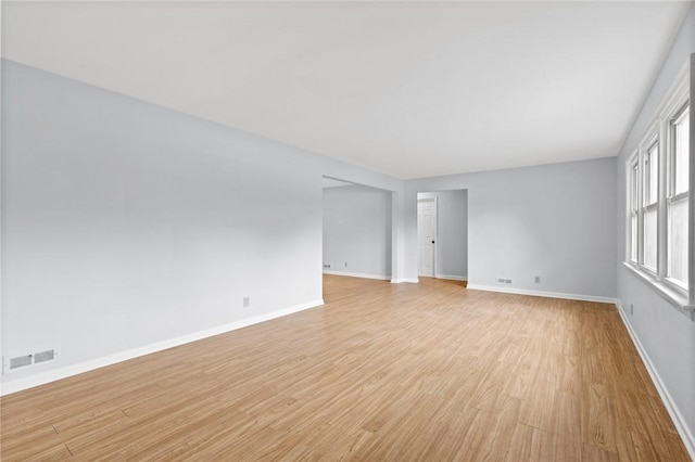 2200 W Henrietta Rd, Brighton, NY 14623 - spare room with light wood-style floors and baseboards