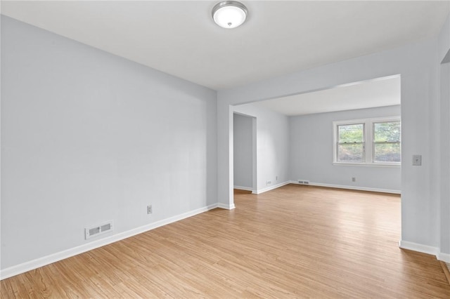 2200 W Henrietta Rd, Brighton, NY 14623 - empty room with light wood-style floors and baseboards