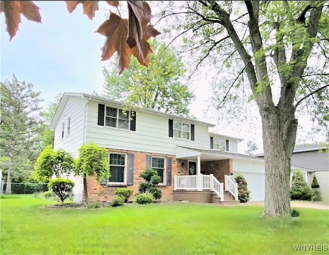 48 Presidio Pl, Amherst, NY 14221 - view of front of property featuring brick siding, a front yard, a garage, and a porch