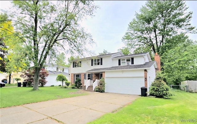 48 Presidio Pl, Amherst, NY 14221 - view of front facade with driveway, a chimney, and brick siding