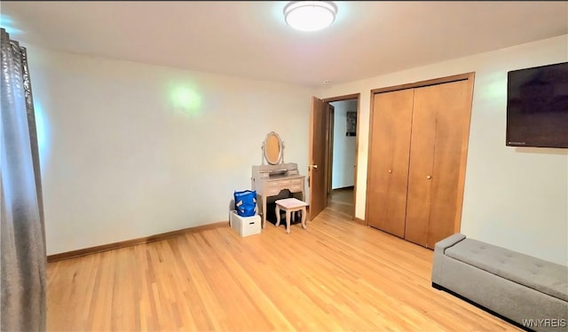 48 Presidio Pl, Amherst, NY 14221 - unfurnished bedroom featuring light wood-type flooring, a closet, and baseboards