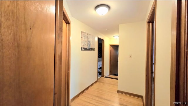 48 Presidio Pl, Amherst, NY 14221 - hallway featuring light wood-style floors and baseboards