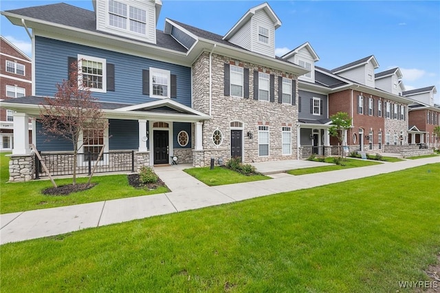 107 California Dr Unit G, Amherst, NY 14221 - multi unit property with a front lawn, stone siding, and a porch