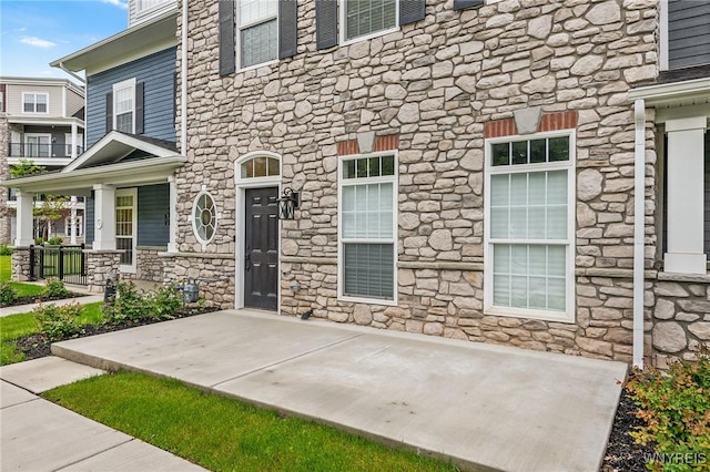 107 California Dr Unit G, Amherst, NY 14221 - entrance to property with stone siding