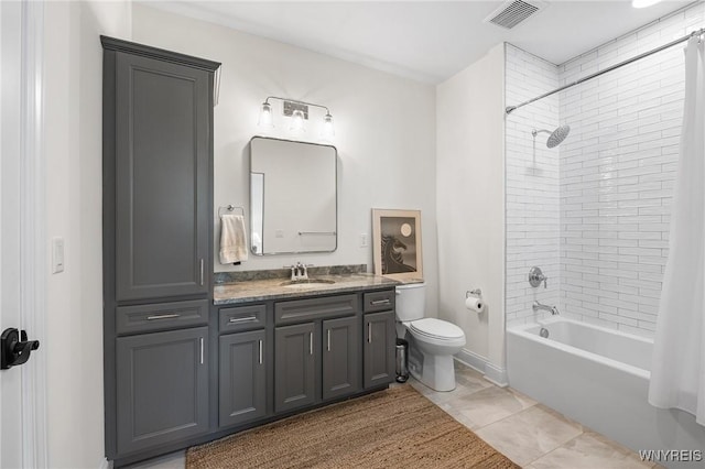 107 California Dr Unit G, Amherst, NY 14221 - bathroom featuring vanity, toilet, shower / bath combination with curtain, and baseboards