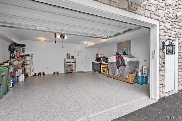 107 California Dr Unit G, Amherst, NY 14221 - garage with a garage door opener