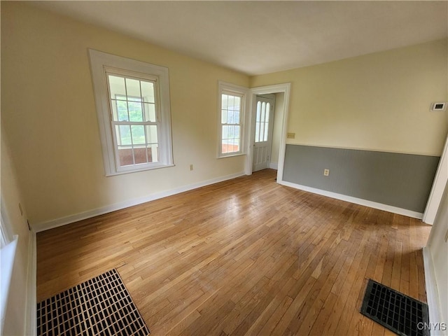 768 Crow Hill Rd, Skaneateles, NY 13152 - spare room with wood-type flooring and baseboards