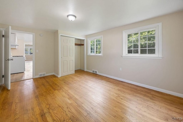 109 Wilkie Pl, Syracuse, NY 13203 - unfurnished bedroom with light wood-type flooring, baseboards, and a closet