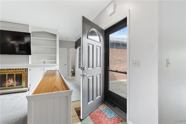 24 The Orch, Manlius, NY 13066 - entryway featuring a fireplace