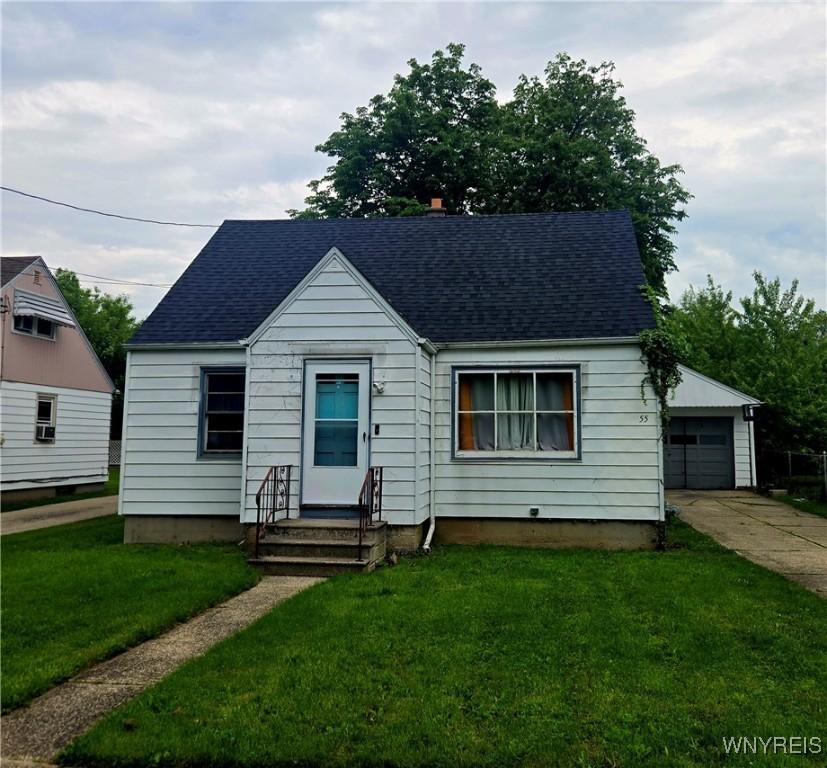 55 Forman St, Buffalo, NY 14211 - view of front facade with a shingled roof and a front yard