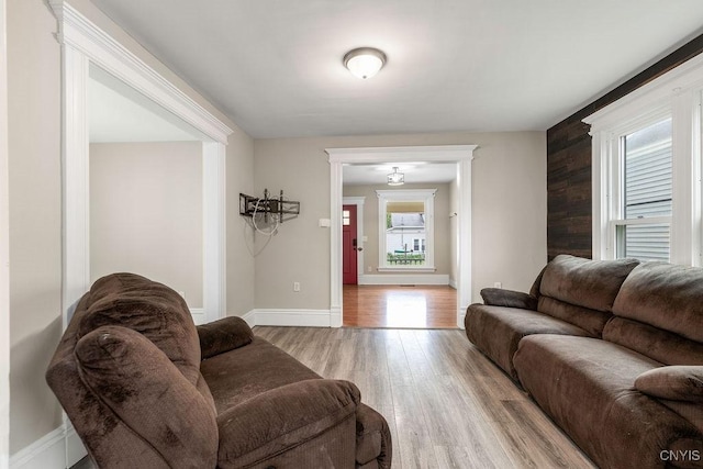 264 S 5th St, Fulton, NY 13069 - living room featuring light wood-type flooring and baseboards