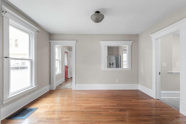 264 S 5th St, Fulton, NY 13069 - empty room featuring light wood-style floors and baseboards