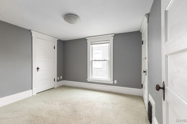 264 S 5th St, Fulton, NY 13069 - spare room featuring light carpet and baseboards