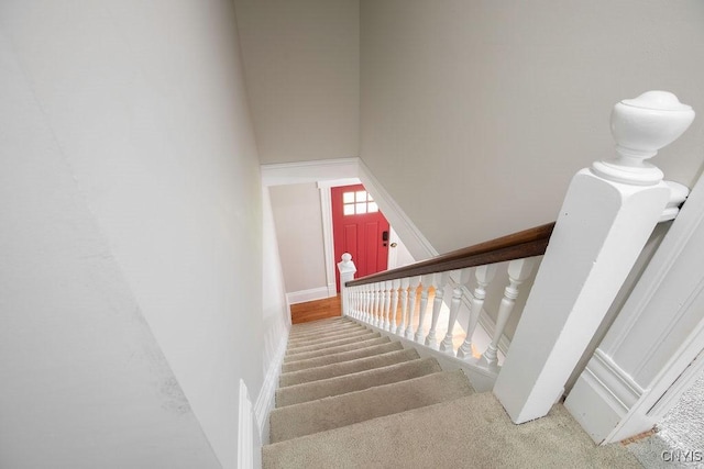 264 S 5th St, Fulton, NY 13069 - staircase with carpet and a towering ceiling