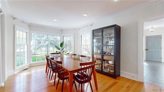 80 Lake St, Urbana, NY 14840 - dining space with crown molding, baseboards, light wood finished floors, and recessed lighting